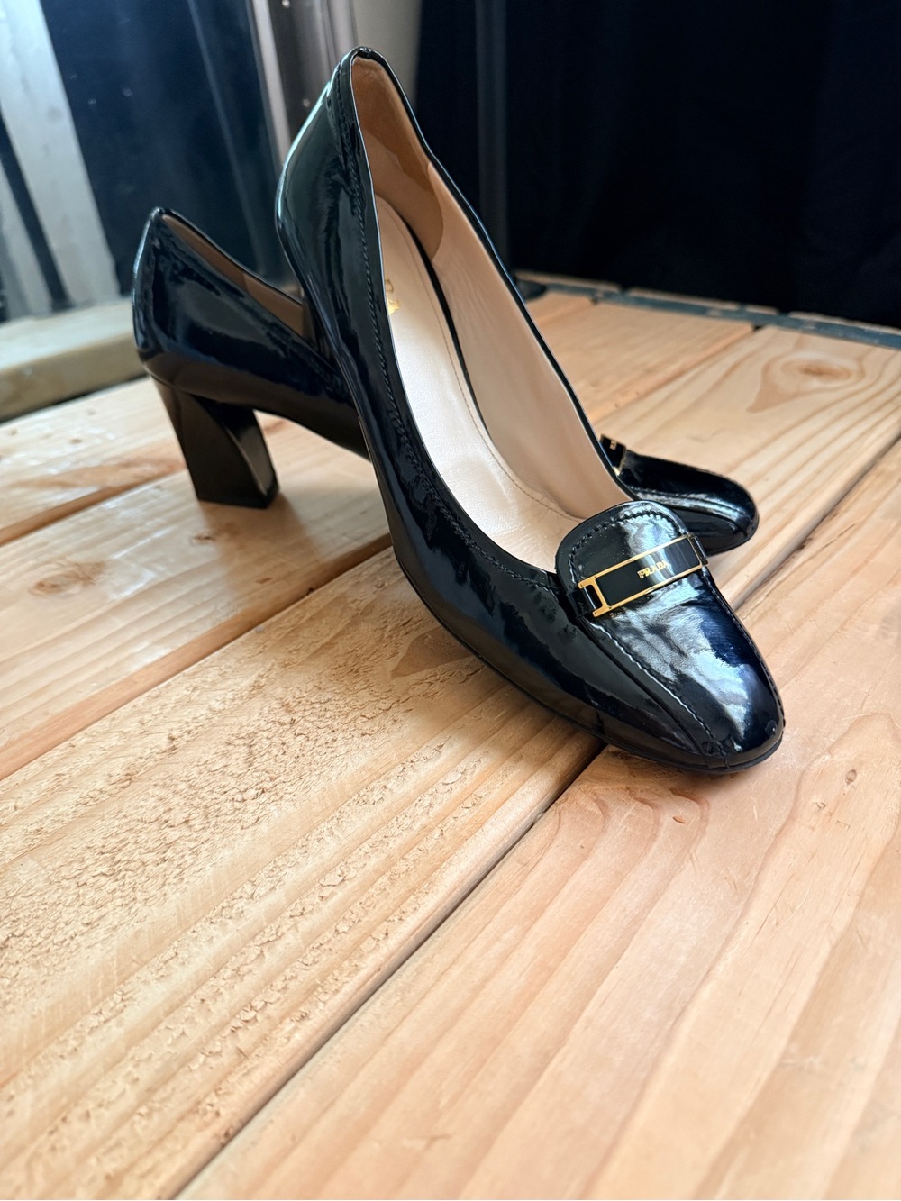 Women's Prada Black Patent Leather Block Heel Pumps with Gold Accent